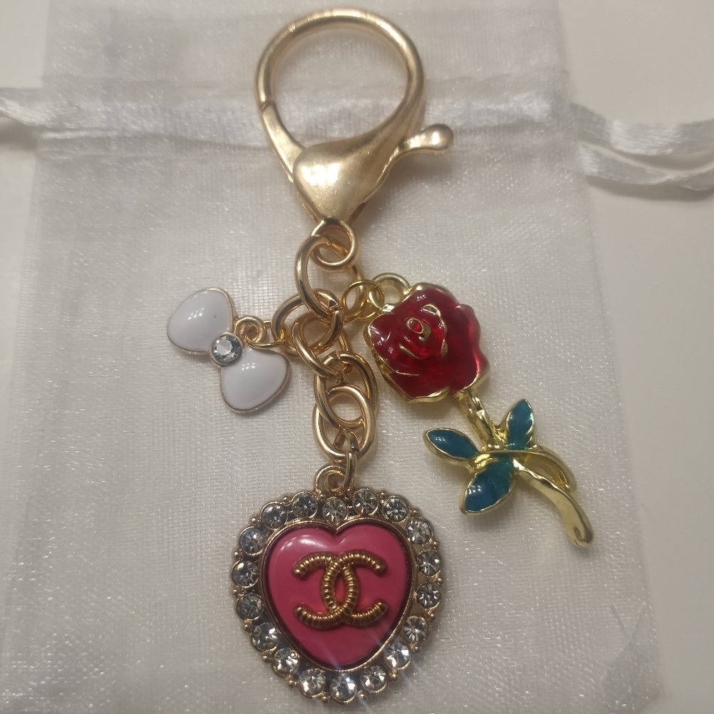 Luxury charm pink rhinestone heart button on an unbranded keychain
